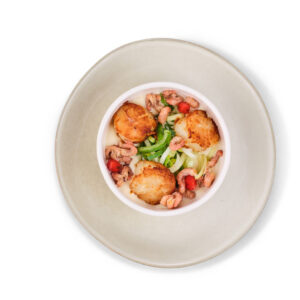 Coquilles met wittewijnsaus en jonge prei